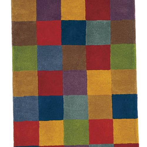 Dywan w kolorową kratę. Projekt Nani Marquina.