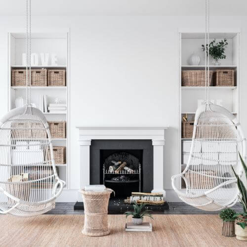 dwa fotele wiszące w salonie