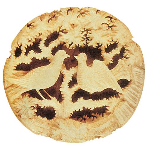 Guzik rzeźbiony w kości. Guzik z pętelką