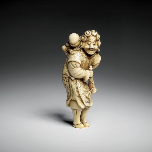 Holender z dzieckiem i trąbką , kość słoniowa, ok. 1820 r.