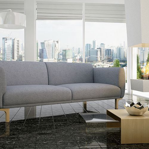 Ich faliste linie zainspirowały twórców kolekcji Enna. Ciekawym kontrastem dla delikatnych kształtów kanapy jest surowa