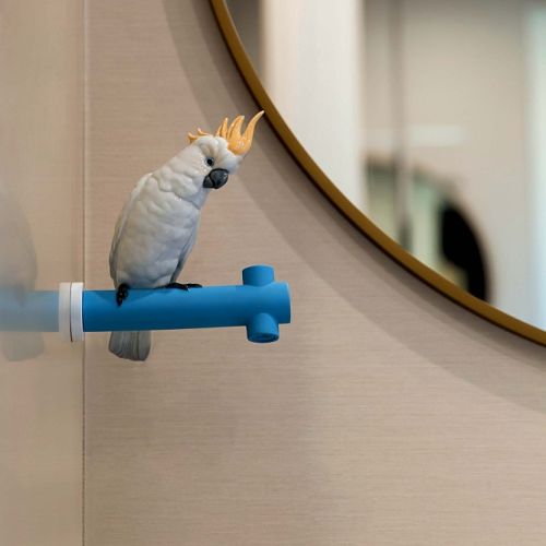 ceramiczny wieszak ścienny Lladró Parrot Hang z papugą