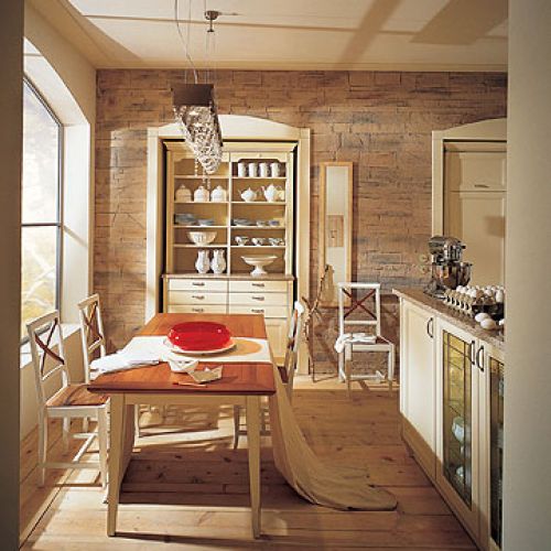 Kuchnia urządzona z kredensem ustawionym we wnęce. ALNO