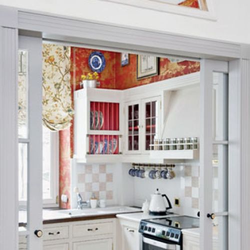 Kuchnie zrobili koledzy gospodarza z pracowni. Roleta została uszyta z tkaniny londyńskiej firmy Colony.