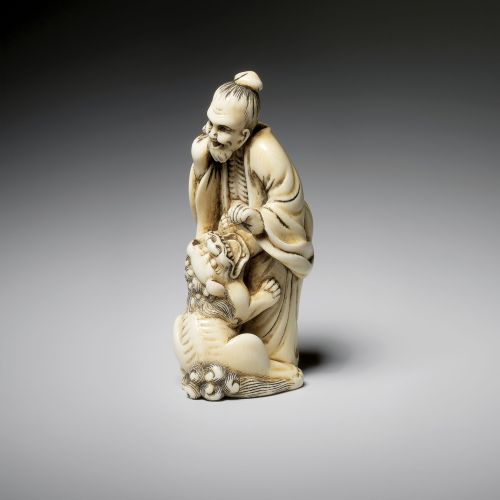 Leżący pies z muszlą , kość słoniowa, ok. 1770 r.