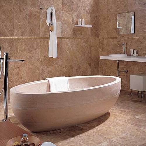 Marmurowa wanna firmy Porcelanosa ma wymiary 190 x 95 x 54 cm. Kosztuje około 16 0 zł. Stoi na