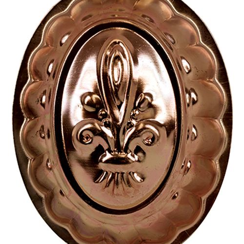 Miedziana, z lilijką. Historia foremek do ciast i na masło