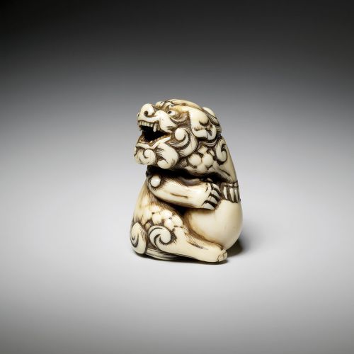 Mitsuharu Shishi trzymający łapy na piłce , kość słoniowa, ok. 1770 r.
