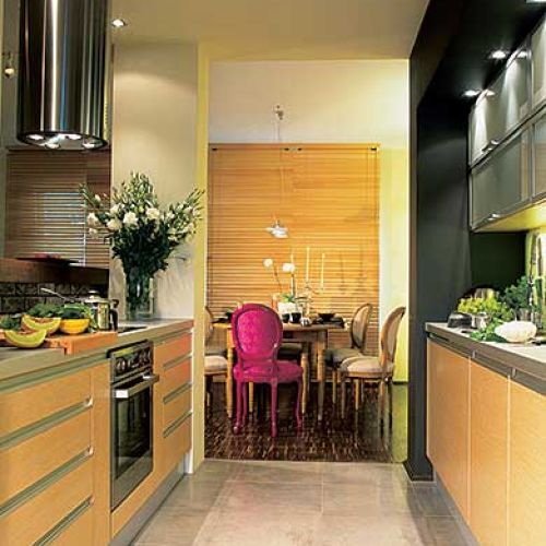 Nowoczesna, funkcjonalna kuchnia - proste szafki i dobre oświetlenie dają wrażenie ładu. Jadalni fantazji dodaje