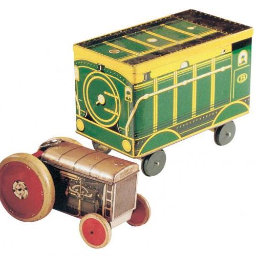 Puszki-zabawki na słodycze - lokomotywa z wagonikami.