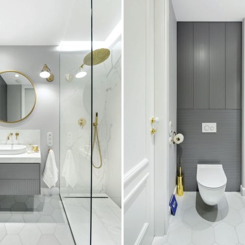 Obszerną kabinę prysznicową wyłożono płytkami gresowymi Infiniti przypominającymi marmur. Dla kontrastu dobrano złotą