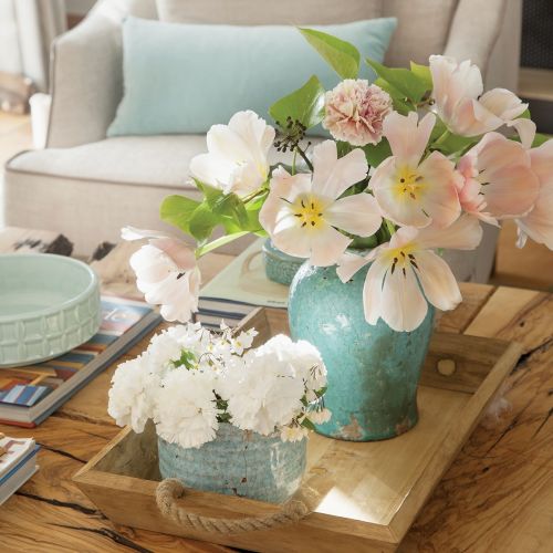 W półcieniu koronkowych zadaszeń, otuleni zapachem kwiatów i rozłożeni na wiklinowych siedziskach. Tak wypoczywają mieszkańcy