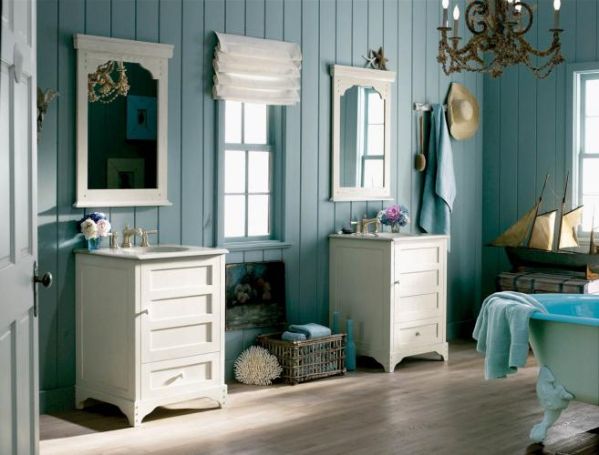 Białe szafki Ballard (8260 zł/szt.)zrobiono z litego drewna. W blacie zamontowana jest żeliwna umywalak ? 4490 zł. KOHLER