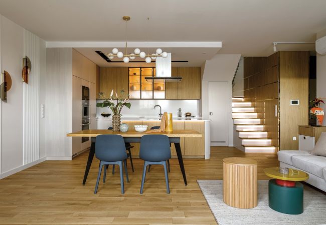 dwupoziomowy apartament w Piastowie z kuchnią wyposażoną w 2 okapy i 2 zmywarki