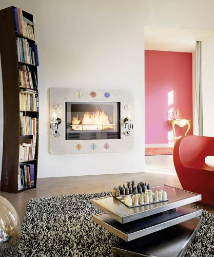 Zabawa światłem - pokój rozjaśni nie tylko ogień w kominku (kolekcja Applilight), ale i zamontowane w jego ramie lampki.