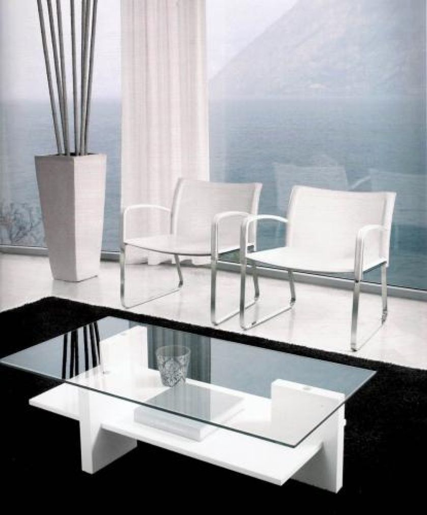 Ulubioną kolekcją kamieni można pochwalić się na półce ze szklanym blatem. Za stolik Zen firmy