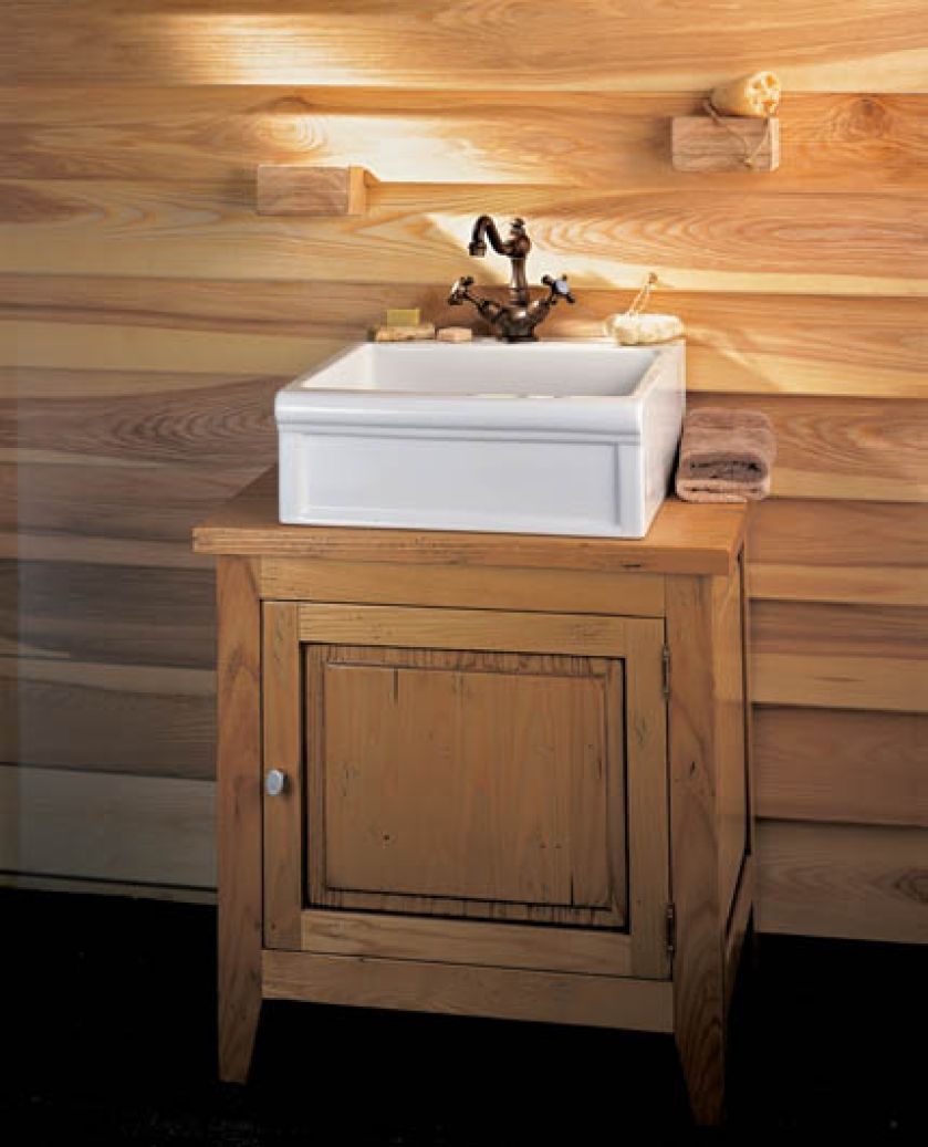 Szafka pod umywalkę Vigneron z drewna jesionowego barwionego na dąb rustykalny. W kolekcji Herbeau znajdziemy