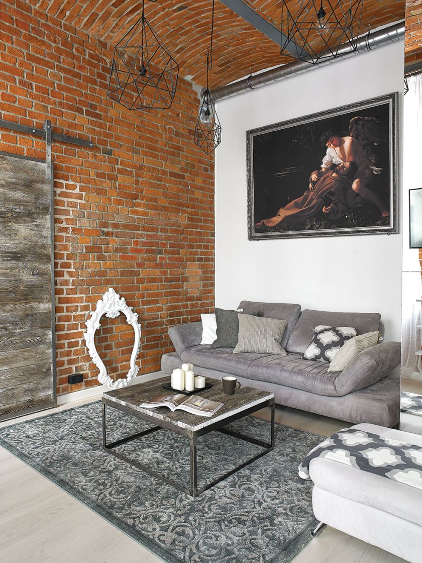 Na ścianie reprodukcja jednego z ulubionych obrazów gospodarza – Ekstazy św. Franciszka Caravaggia.