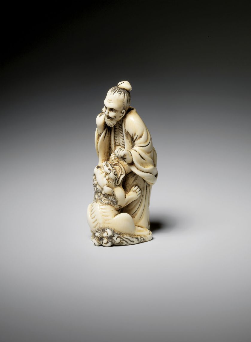 Leżący pies z muszlą , kość słoniowa, ok. 1770 r.