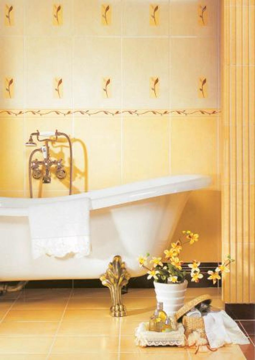 Łazienka wyłożona płytkami Delfia. Żółte kafle w cenie 57 zł/m2, kremowe płytki w listki (30 x 45 cm) -