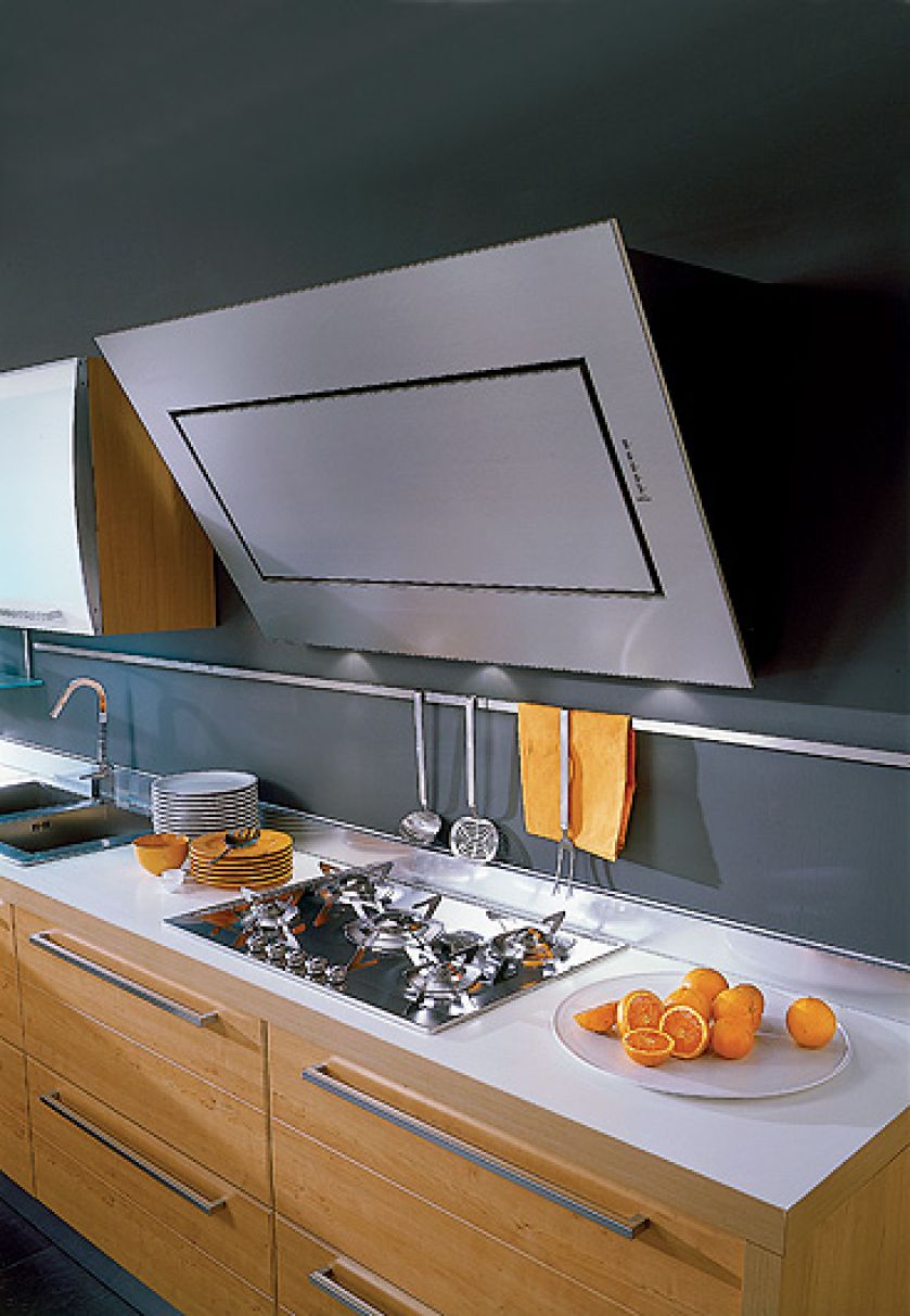 Nowczesny okap dobrze wygląda w kuchni urządzonej minimalistycznie.