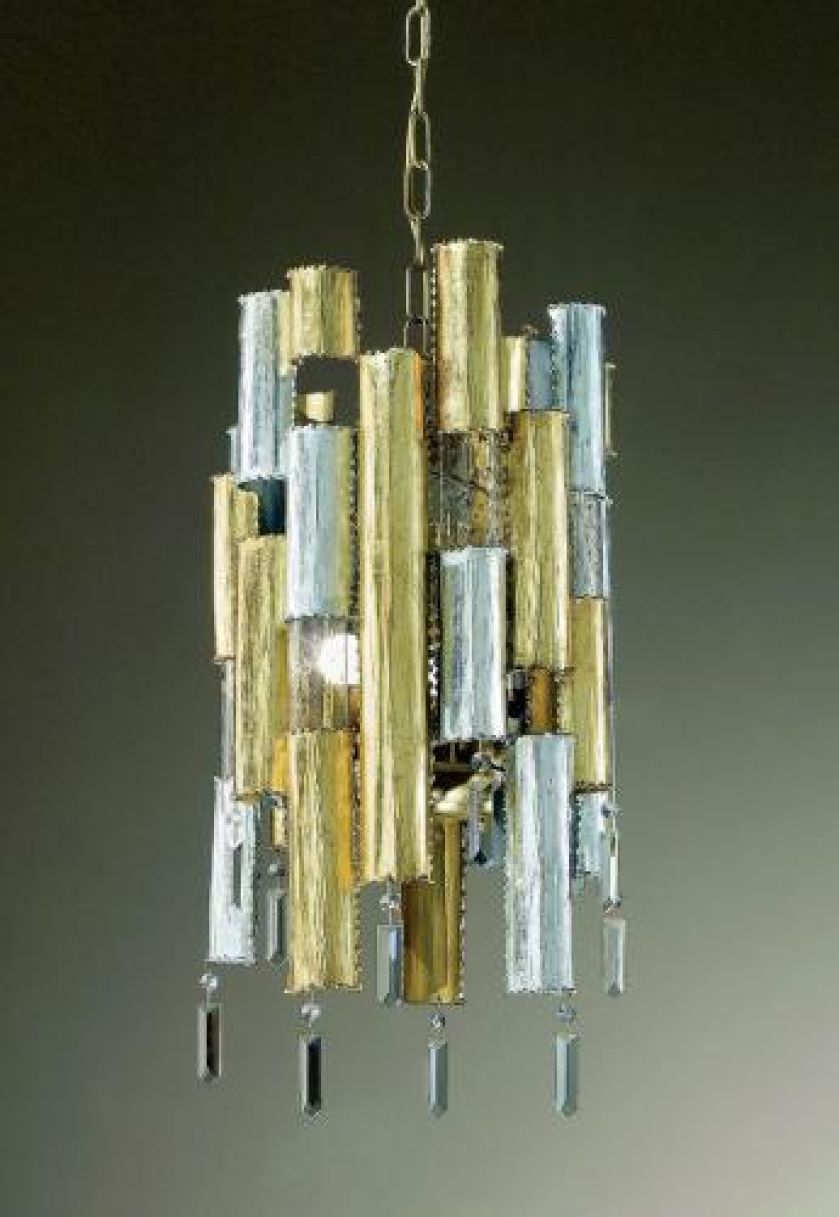 Wykonana ręcznie, pokryta płatkami złota i srebra, z kryształami Swarovskiego, firma MM Lampadari, cena –