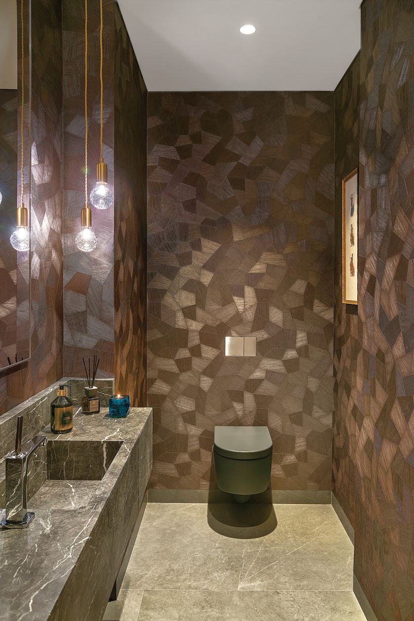 Praktycznie i przytulnie: podwarszawski dom w szarości, brązie i karmelu