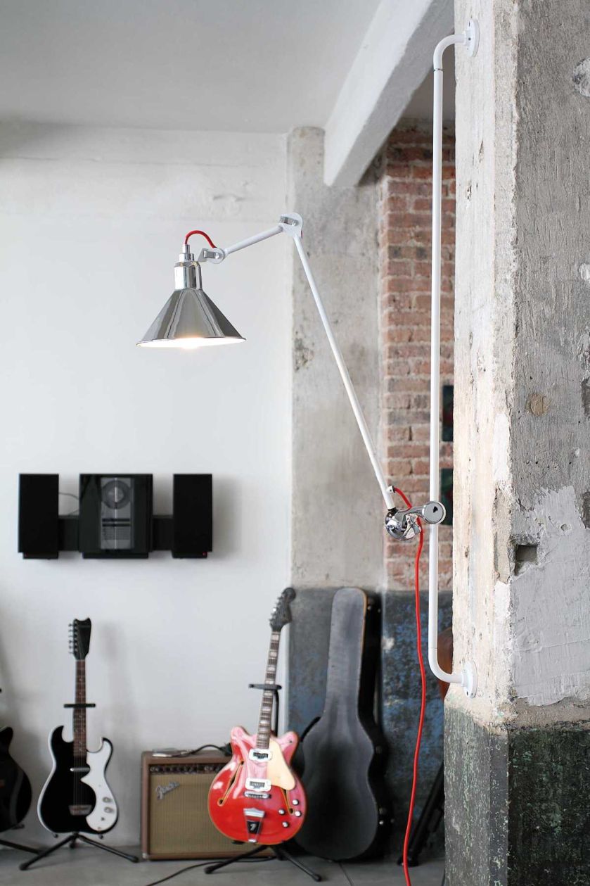 Surowe lampy, które zostały zaprojektowane z myślą o przestrzeniach biurowych i fabrycznych, zauroczyły samą Coco Chanel.