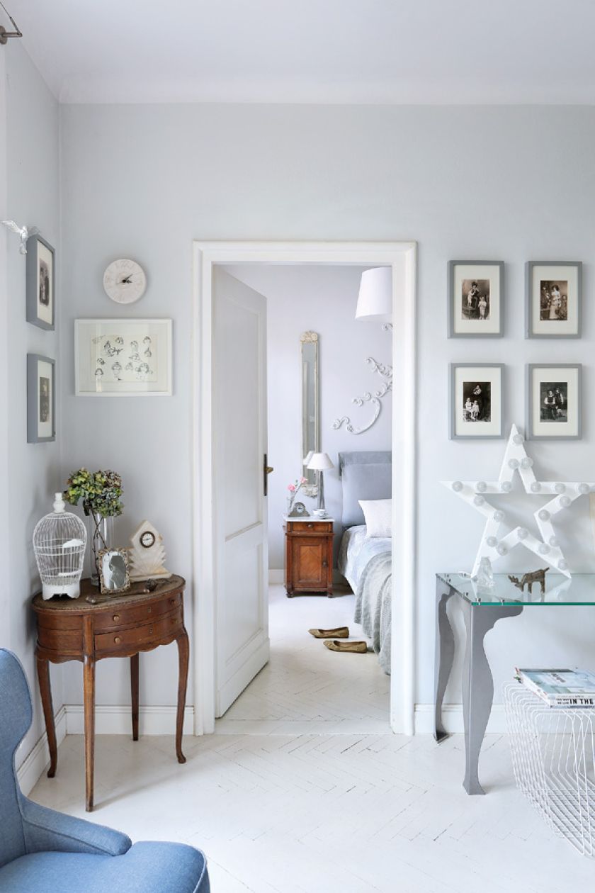 Symetria wprowadza poczucie ładu. Twoja własna galeria: jak powiesić obrazy na ścianie lub ustawić na półce