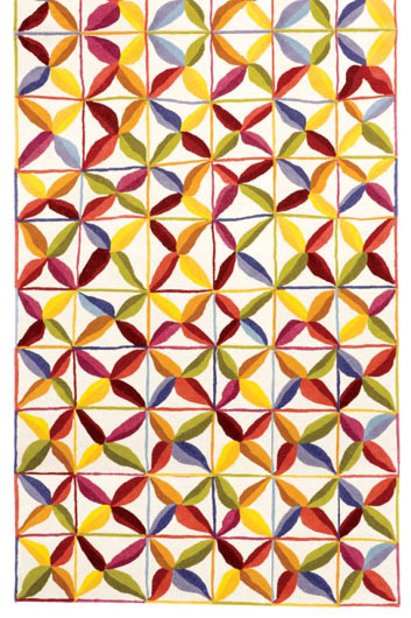 Kolorwy dywan z mozaikoym motywem. Projekt Nani Maquina.
