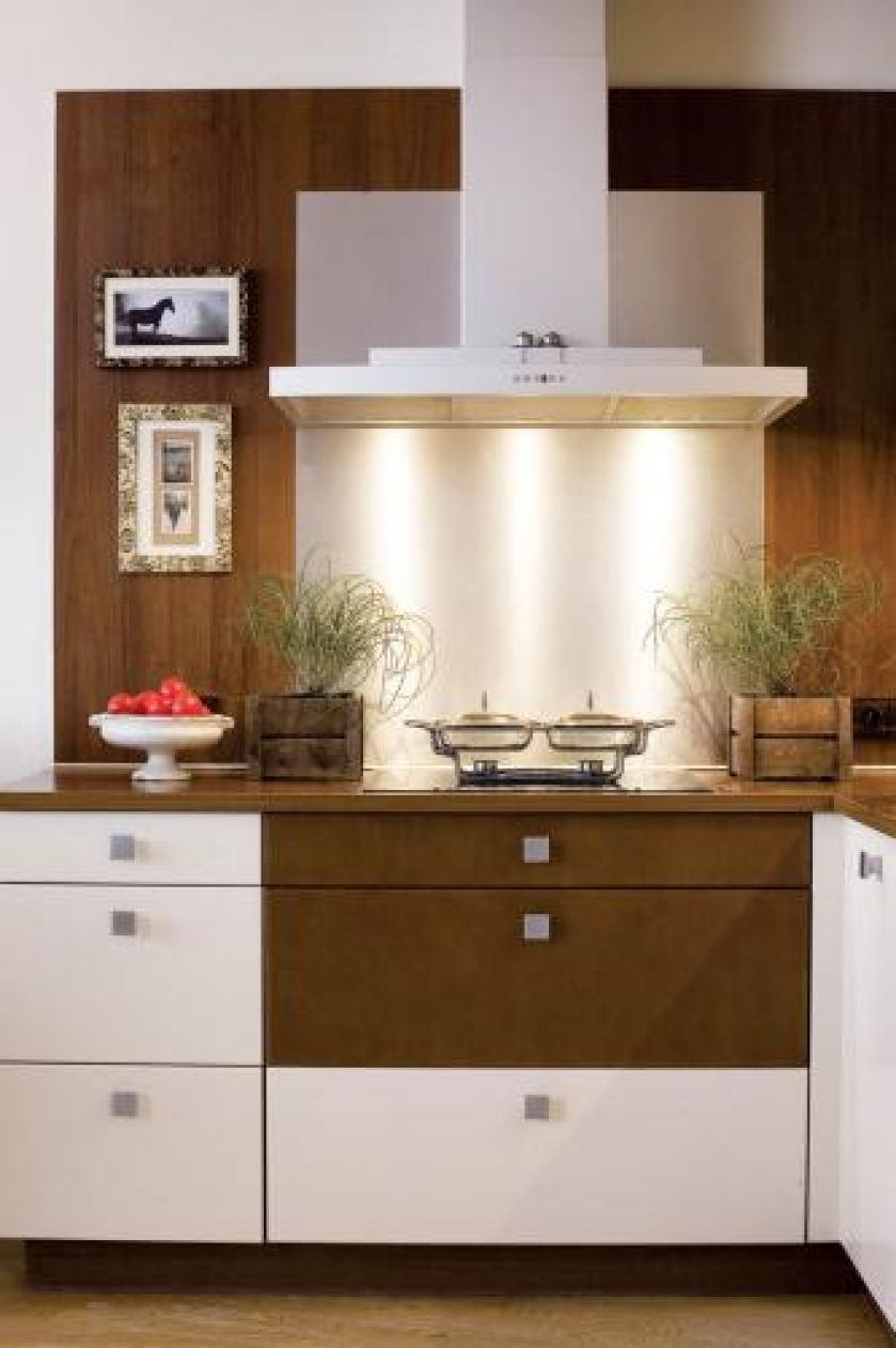 W kuchni prosto i nowocześnie. Apartament, który urządziły meble