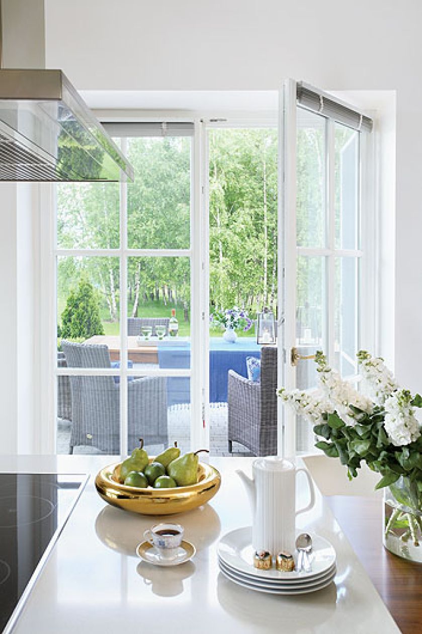 Wyjście z kuchni na taras. Biedermeier i odrobina dizajnu