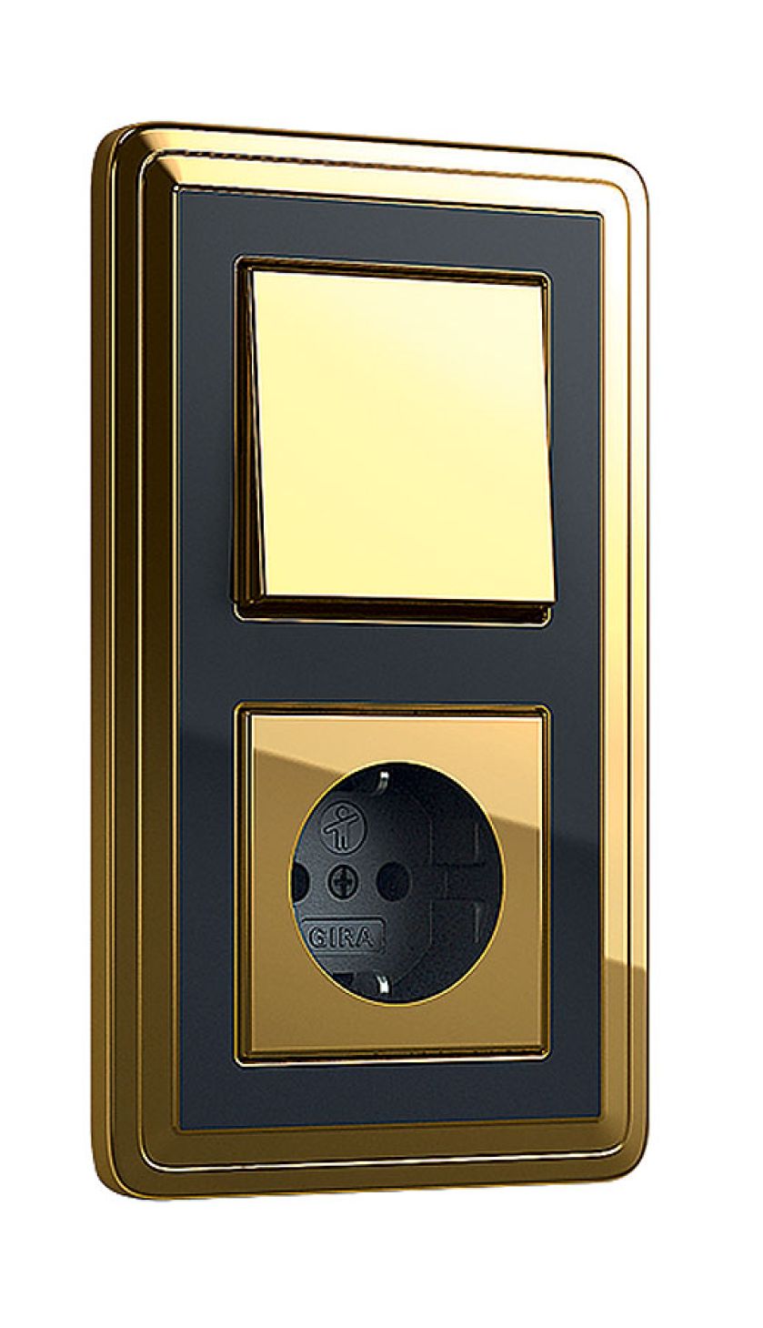 Mosiężny przełącznik i gniazdo w jednym, GIRA