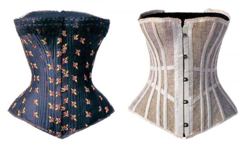 Czarny, jedwabny gorset z haftowanymi kwiatuszkami, na metalowych fiszbinach, 1890 r., Anglia. Biały, bawełniany