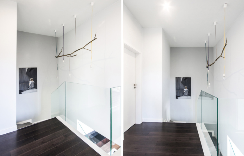 Jasne, przestronne wnętrze w nowoczesnym wydaniu. Choć w całej stylistyce dominują czerń i biel, naturalne