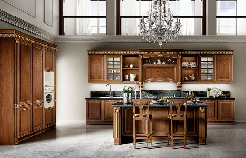 Pałacowa Dolcevita włoskiej marki Stosa – wyspa, zdobiona pilastrami i patynowana na złoto, ma wygodne wcięcie na nogi STUDIO