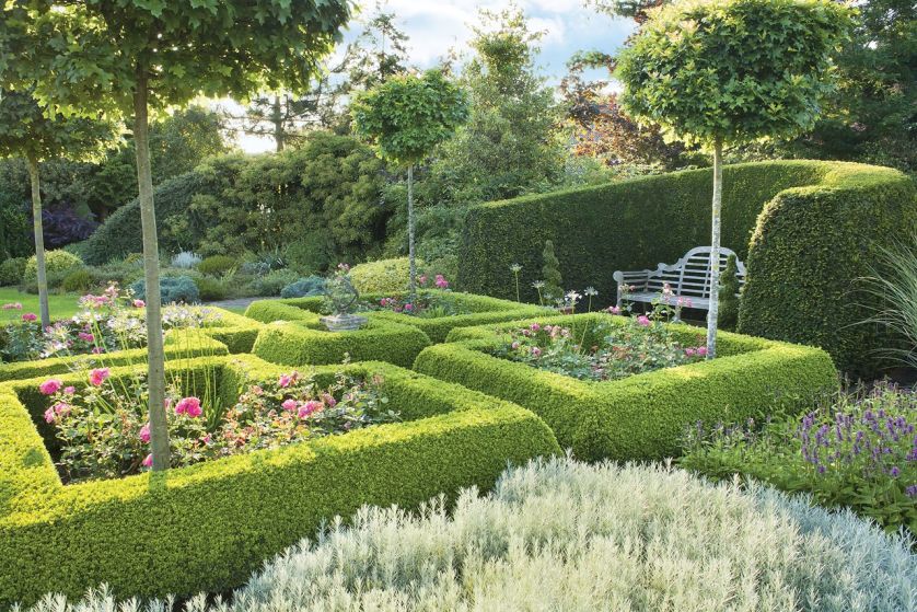 Czy klomby kwiatów we wszystkich barwach tęczy pasują do nowoczesnego domu