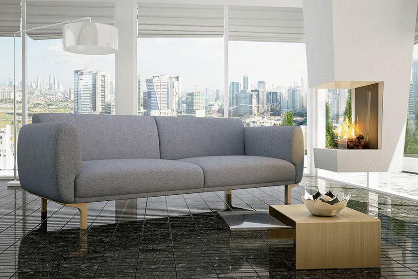 Ich faliste linie zainspirowały twórców kolekcji Enna. Ciekawym kontrastem dla delikatnych kształtów kanapy jest surowa