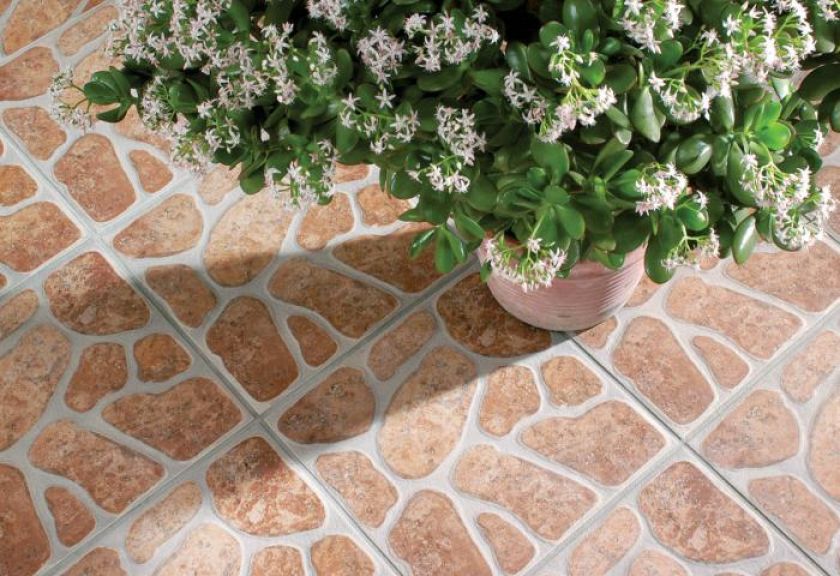 Kolekcja Giewont/Wierch - tarasowe płyty świetnie imitują naturalne otoczaki. Do wyboru trzy odcienie: Grys, Beige