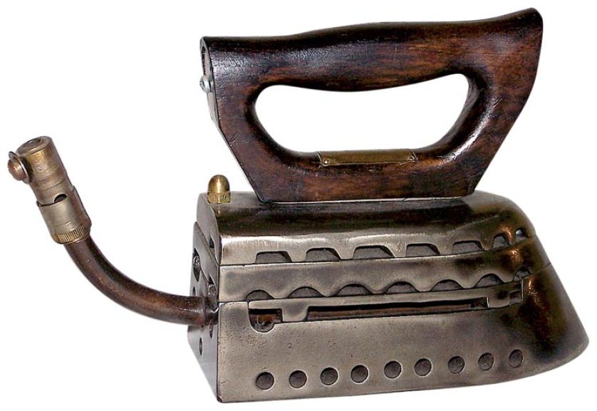 Żelazko nagrzewane palnikiem wewnętrznym na gaz ziemny z instalacji lub butli. Firma ALFA LBK, patent