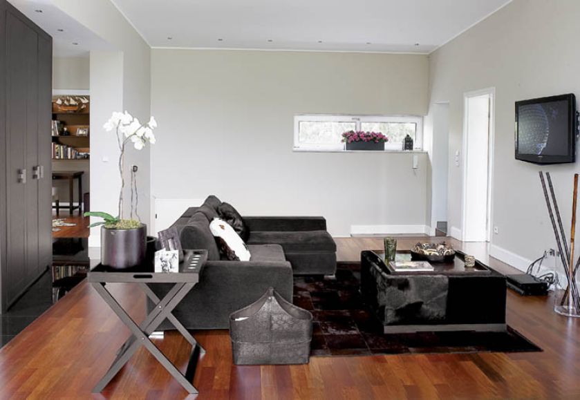 Apartament w parku nad stawem ma wszystkie zalety willi z ogrodem. Nowoczesny i wygodny.