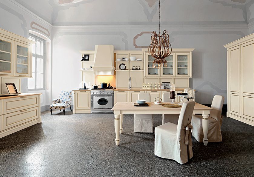 Krzesła w stylowych bawełnianych sukienkach uzupełniają zestaw mebli Elite w odcieniu... świeżego masła, Cesar.