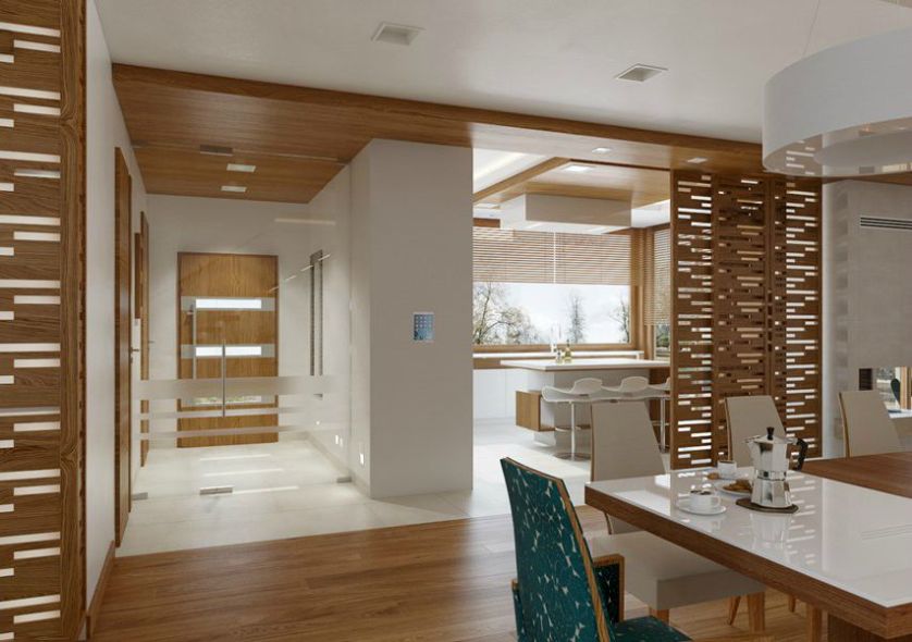 Przesuwane drzwi i dekoracyjne przepierzenia to sposób na oddzielenie kuchni od salonu