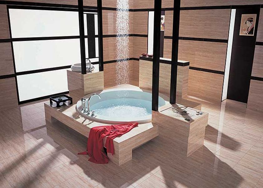 Łazienka w japońskim stylu. Nad okrągłą wanną zamontowano panel prysznicowy. Płytki z kolekcji Navona (30 x 60 cm) kosztują