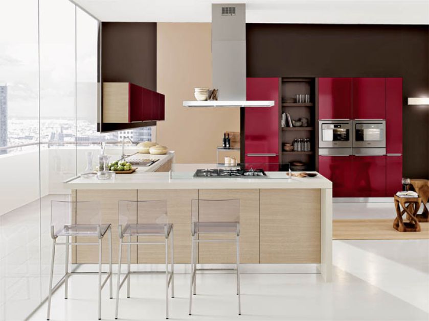 Kuchnia Stosa, model Diamante-rosso amaranto. Fronty laminowane na wysoki połysk oraz drewnopodobne blaty z konglomeratu