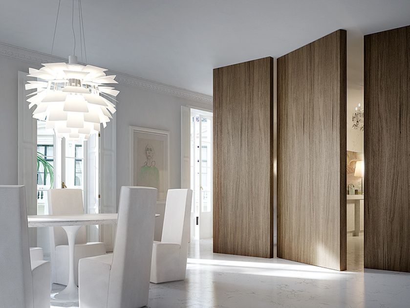 Drzwi jak ruchoma ściana, otwierają się na obie strony, można je pomalować, wyłożyć tapetą, nakleić