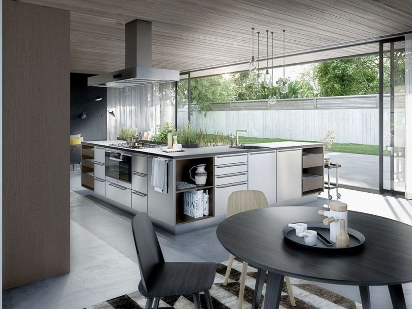 URBAN, z ziołowym ogródkiem obok wyspy po rozsunięciu szklanej ściany kuchnia powiększa się o taras, SIEMATIC.