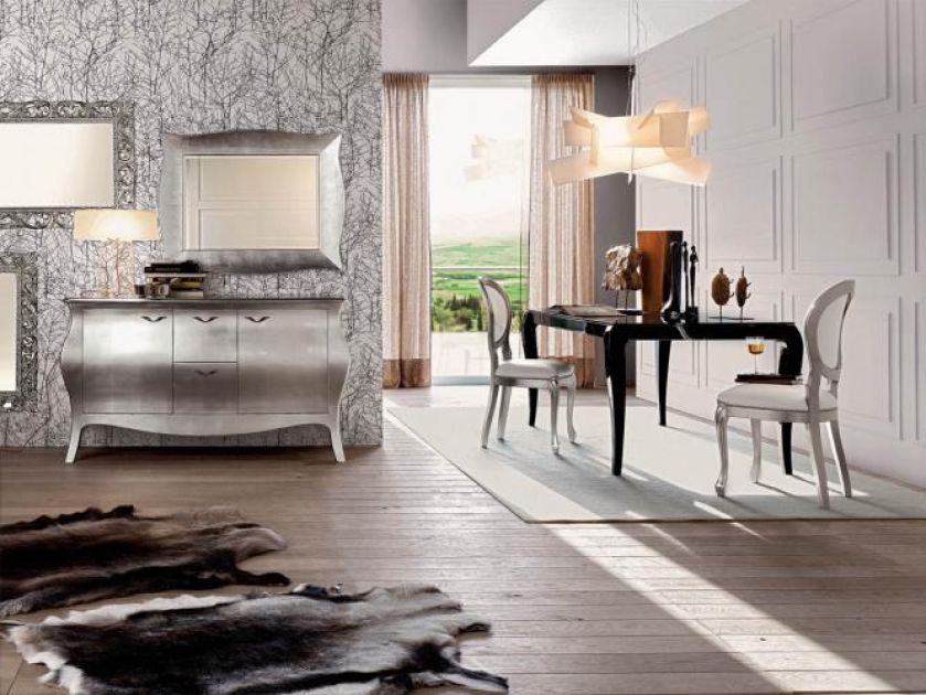 Vogue od Santarossy: stół z czarnym szklanym blatem - 3060 zł, krzesło - 2160 zł, komoda - 7290 zł. HEBAN