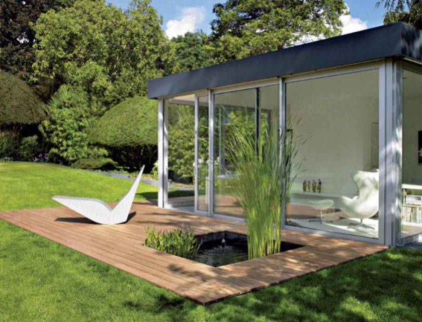 Oczko wodne w... tarasie. Cena deski tarasowej z modrzewia ? 59 zł/mb. KOMFORT