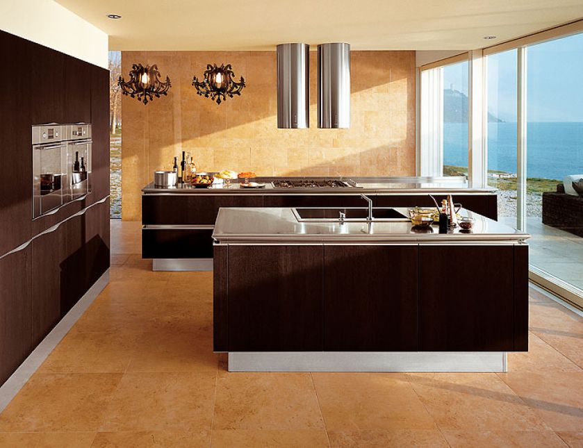 Stal okapów, piekarników i blatów na pierwszym planie. INTERCOMODO